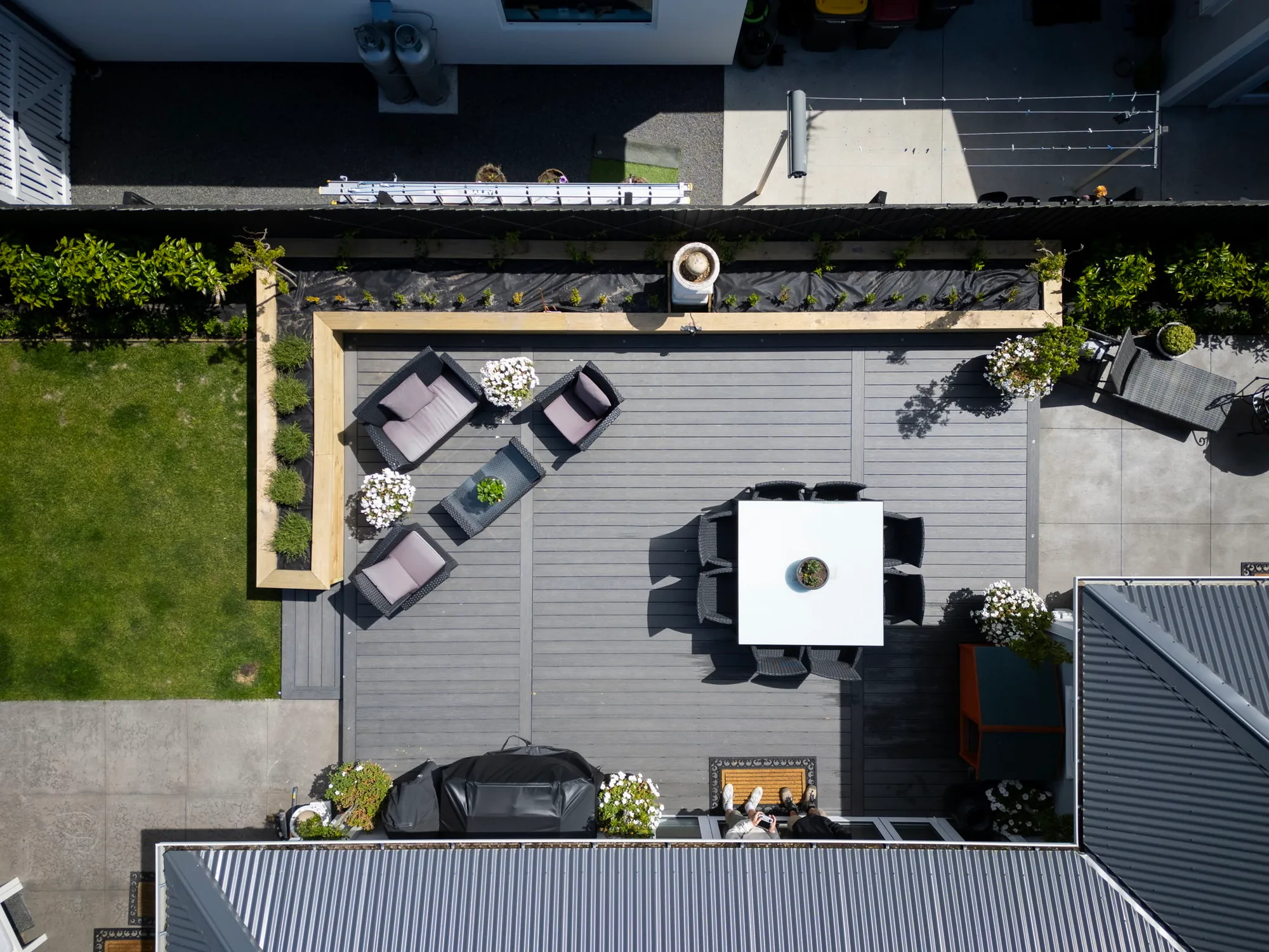 Aerial drone view of a finished Decks R Us outdoor build in Christchurch - deck, landscape and section context